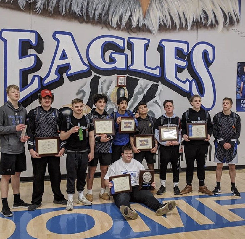 The wrestlers pose for a photo after completing this weekends regional tournament in 2nd place.