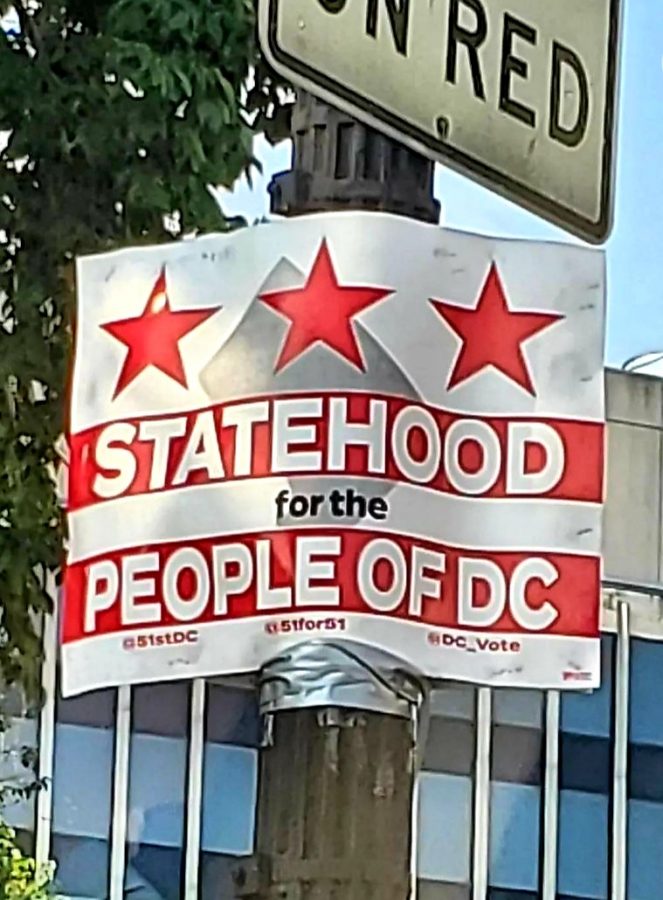 Signs+posted+around+the+District+of+Columbia+demonstrate+calls+to+make+the+district+a+state.+