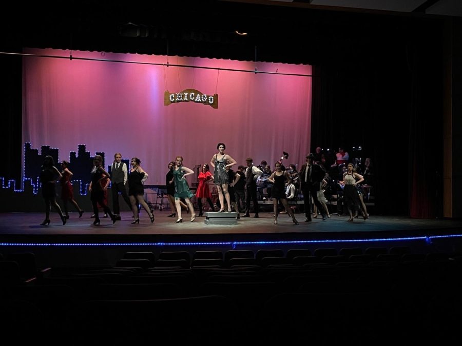 The cast of BHS Chicago production prepares for their show in a dress rehearsal.  Image from BHS Eagle Way Theatre Company on Instagram.