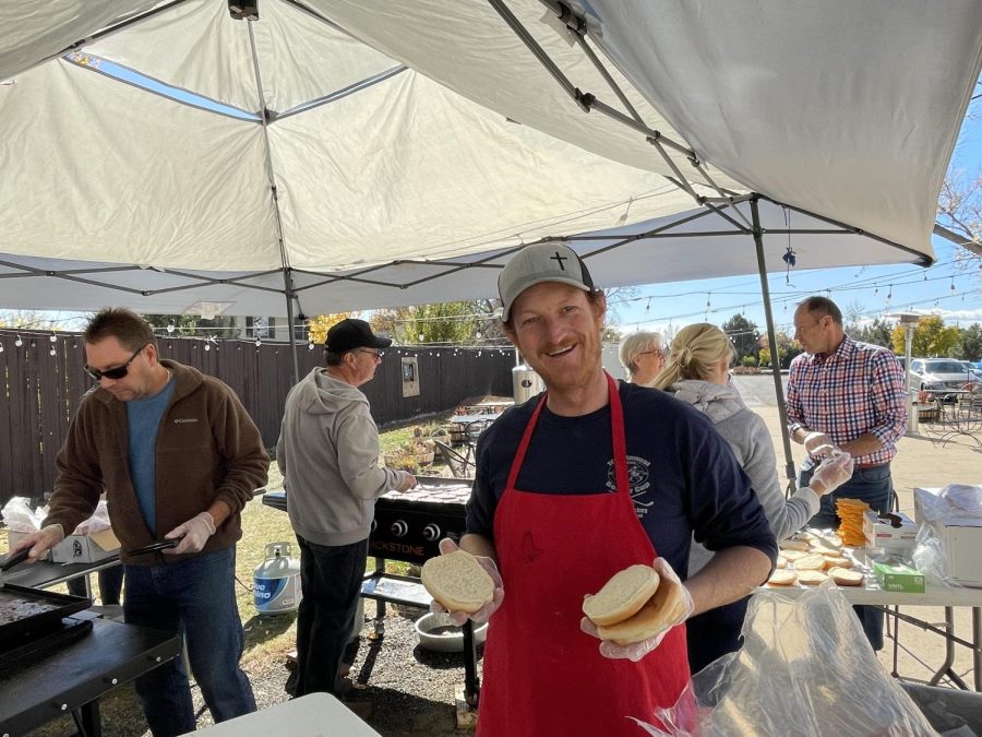 Youth Pastor Billy Beichley takes a break from making burgers. On Wednesdays, Beichley works with a crew of other volunteers to prepared between 350-400 burgers and cheeseburgers for BHS students.