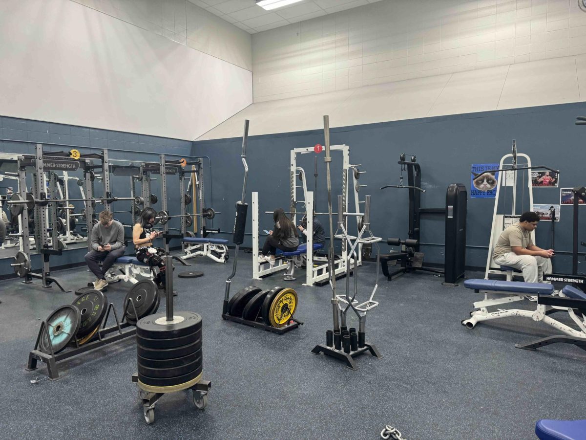 Working hard, or hardly working! 
The Broomfield High School Weight Room often has more lifting phones than weights.